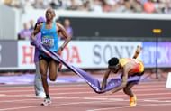 Simbu crossing the finishing line in Tokyo 2025 Worlds (Image via: Getty_
